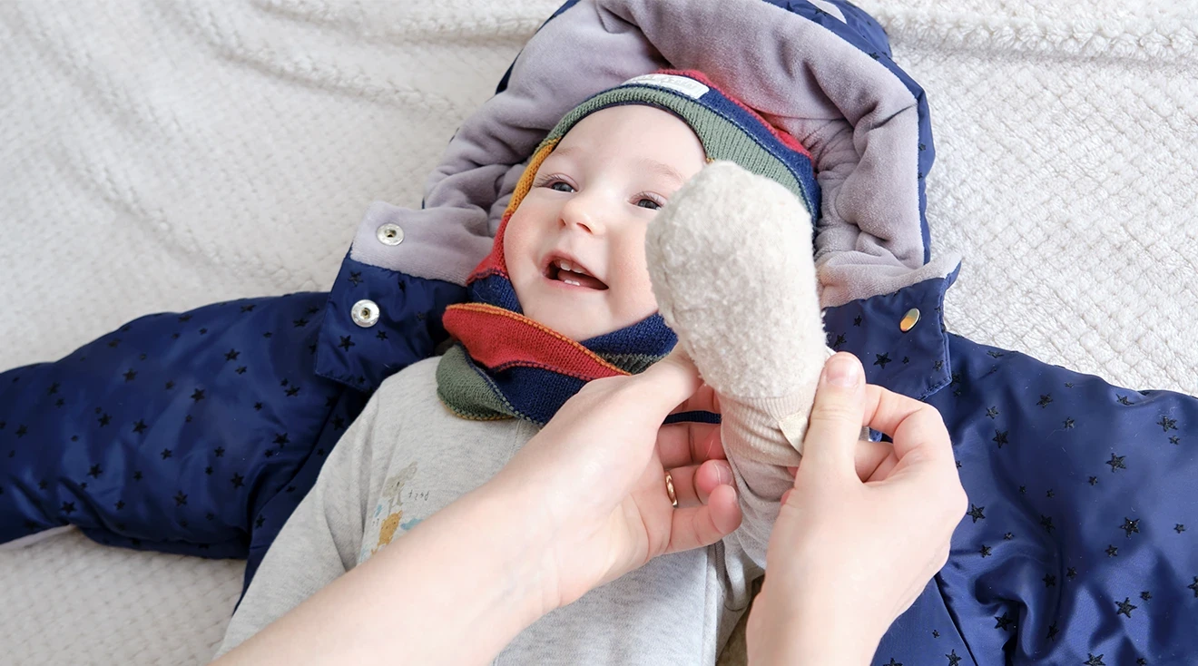 Protect your baby's face and hands from the wind